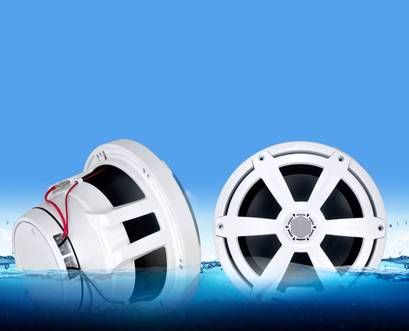 White marine audio speakers with waterproof design floating on blue water surface.