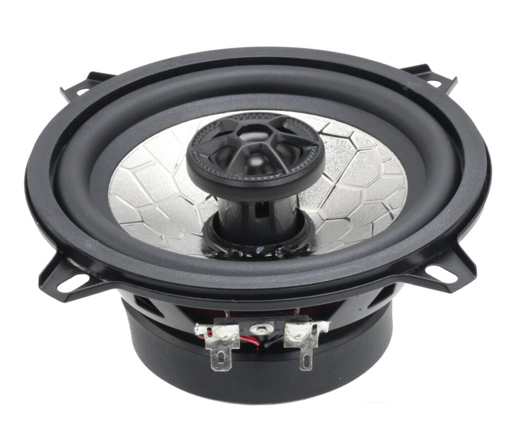 Angled view of CMC5G3 5-inch coaxial speaker featuring 35W RMS, 1-inch woofer coil, 0.5-inch PEI dome tweeter, 4-ohm impedance, delivering clear sound from 63Hz to 20kHz.