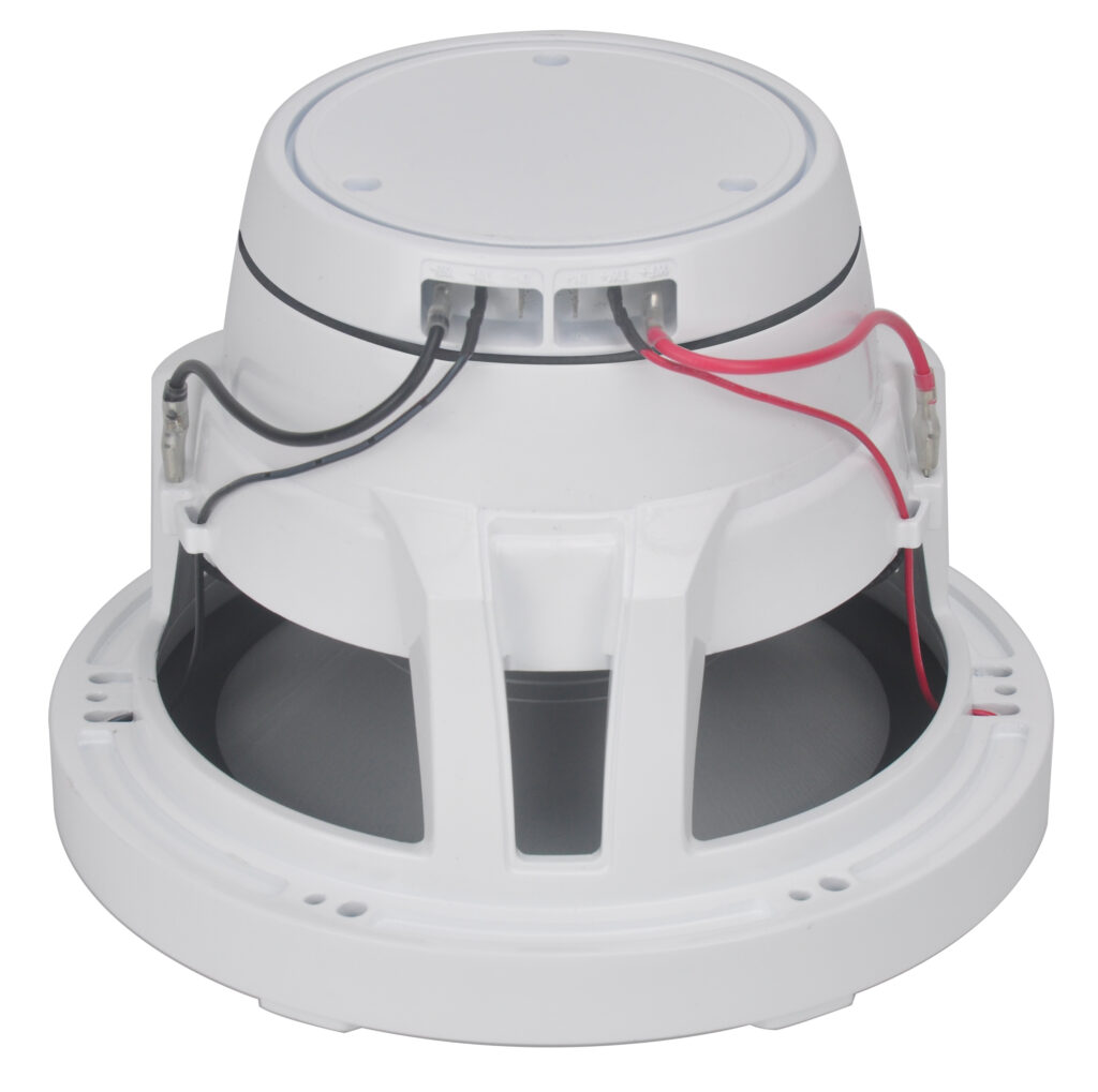 White marine speaker from bottom angle showing internal components, mounting tabs, and electrical connections with red and black wires.