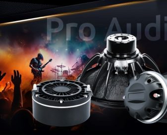 pro audio Pro Audio speakers and drivers with concert stage background showing guitarist and cheering crowd